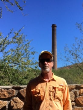 Mitch with Ramona the smoke stack behind him (yes, they named the smokestack).